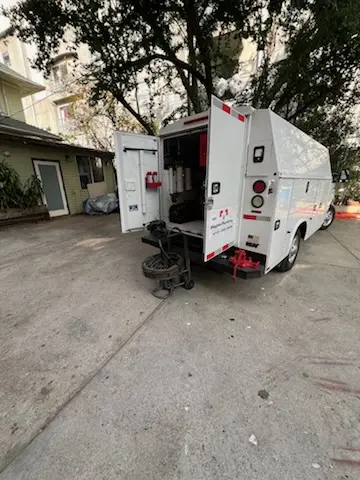 Magnet Plumbing service vehicle on-site for Grease Trap Cleaning in Lehigh Acres